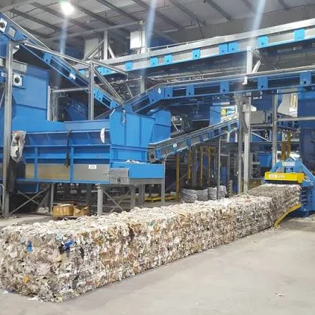 Baled recyclables leaving a baler at a material recovery facility