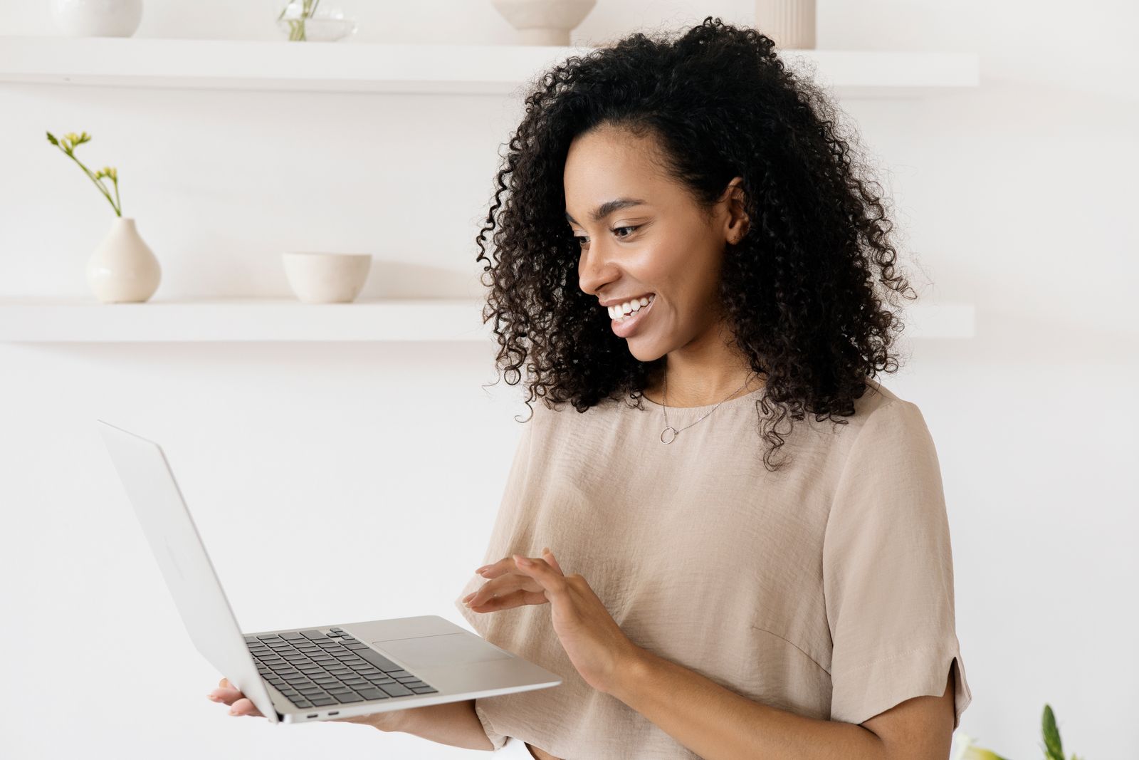 A person reviewing their tax plan on a laptop at home