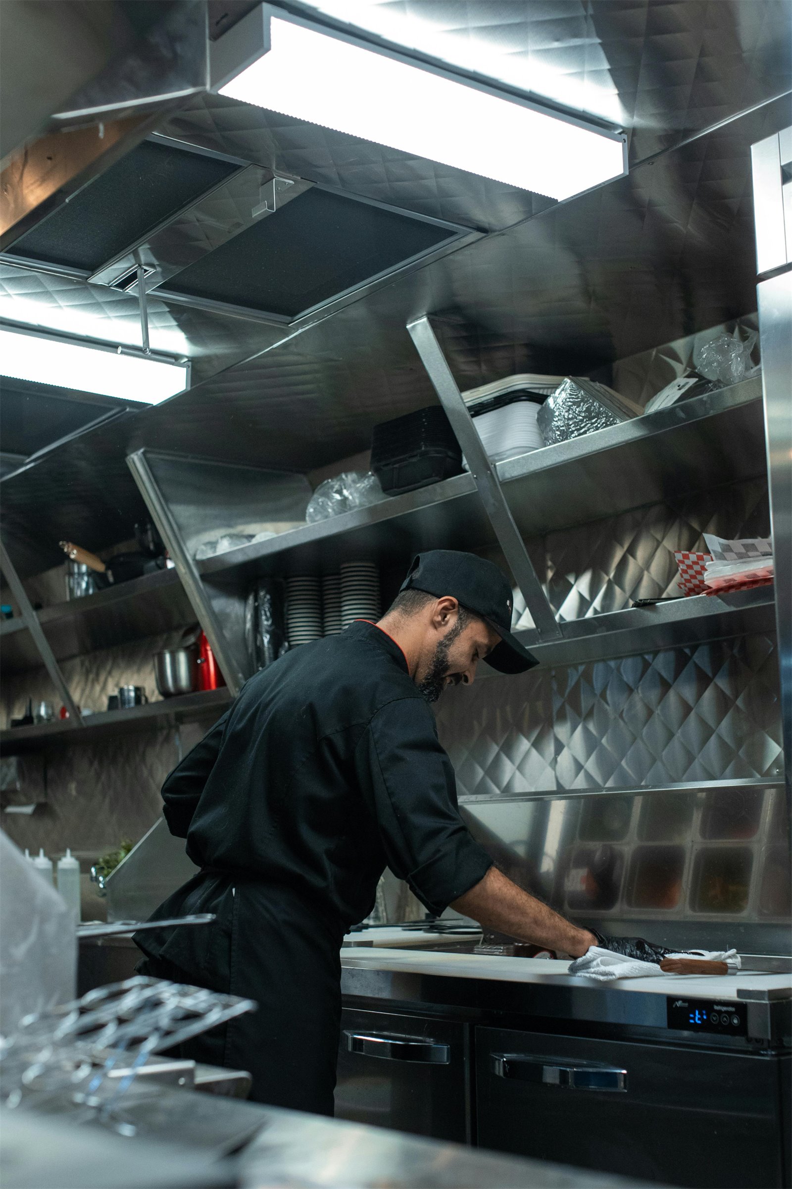 Head chef reviewing a menu with the brigade