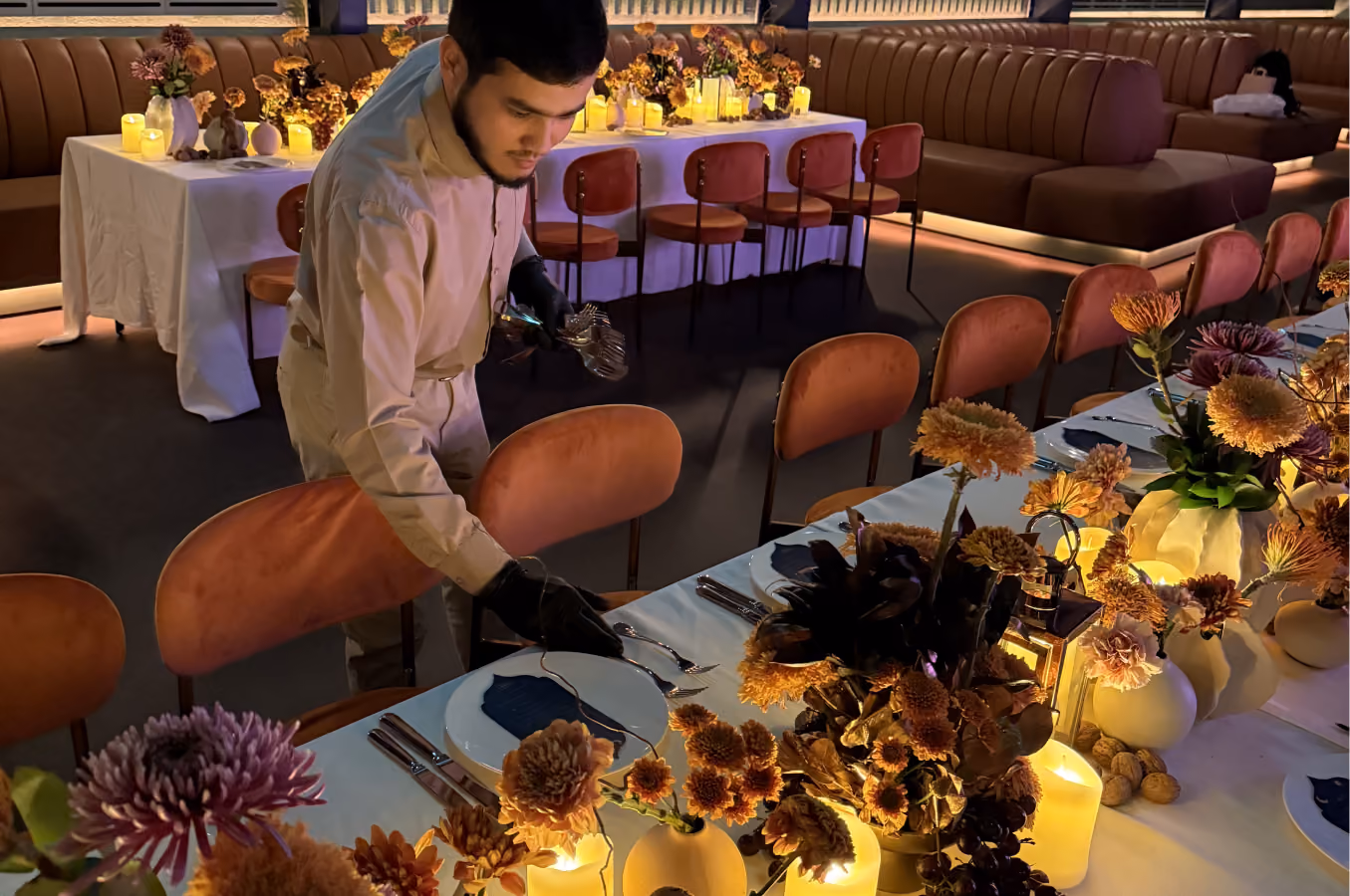 Melas waiter working the floor during an MDLBEAST night