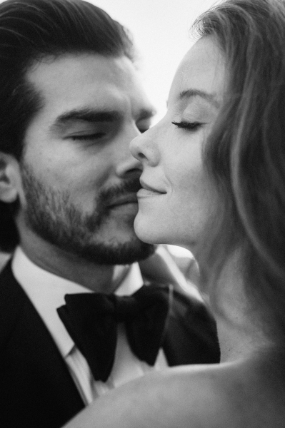 Intimate black and white portrait of newlyweds at their elopement