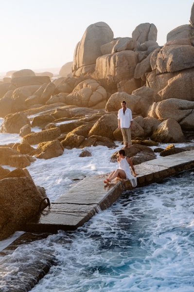 Couple enjoying a romantic sunset session along the coast of Cape Town, South Africa