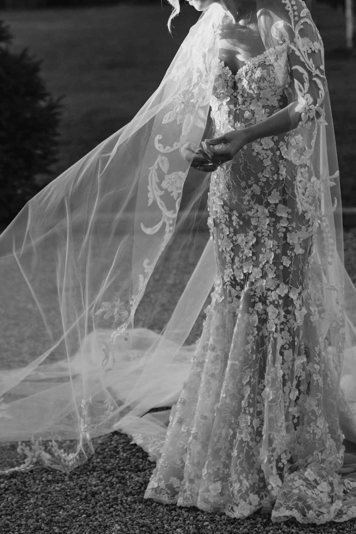 Black and white editorial portrait of a bride in Galia Lahav couture lace wedding dress
