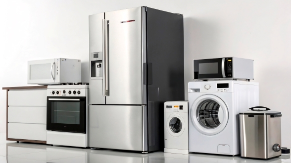 Range of domestic appliances including fridge freezer, washing machine, oven, microwave and small kitchen appliances.