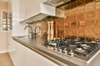 Gas hob in a modern Bristol kitchen requiring professional domestic appliance repairs.