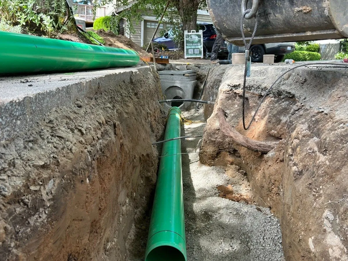 Pipes prepared in a trench for sewer installation in Seattle