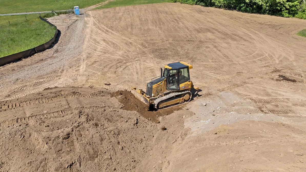 A bulldozer removing debris in a job site in Seattle