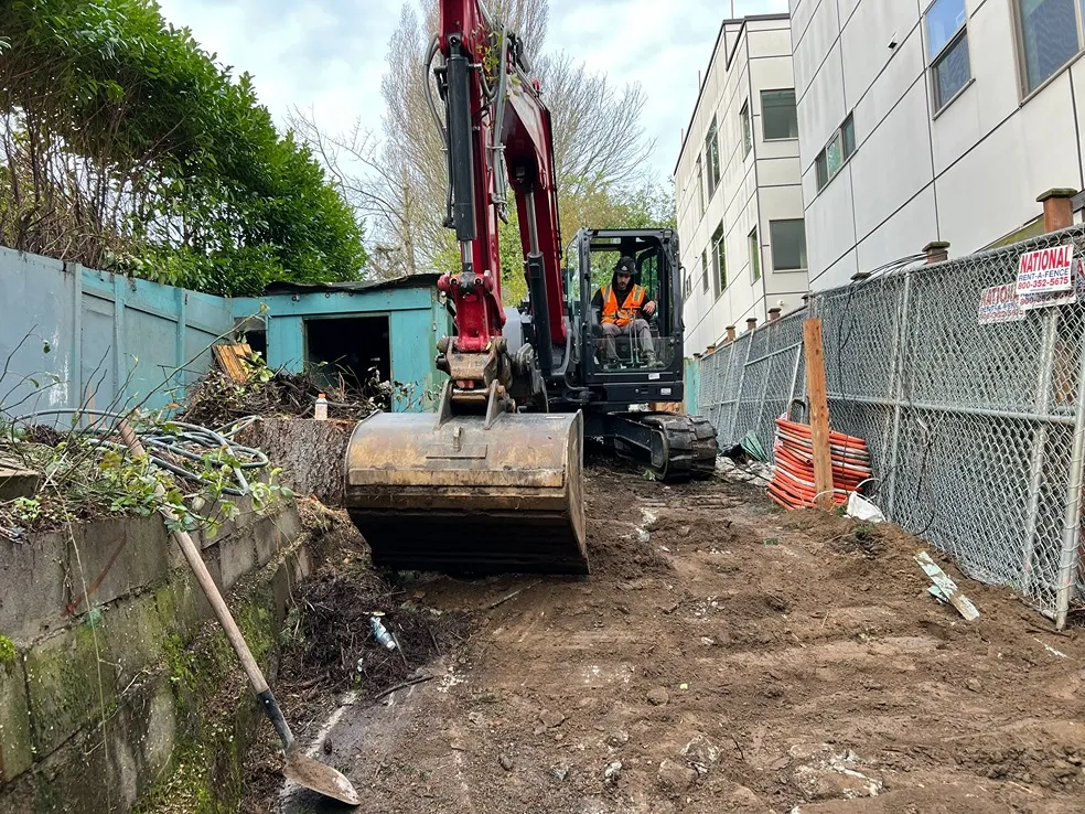 A newly arrived excavator getting ready for excavation in Seattle