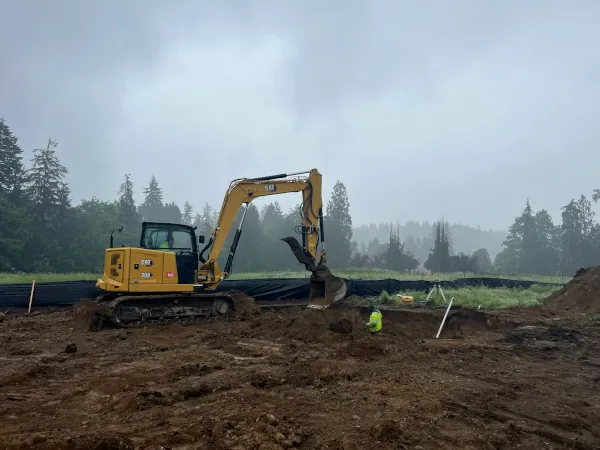 A mass excavation site before building a high-end estate in a vacant lot Seattle