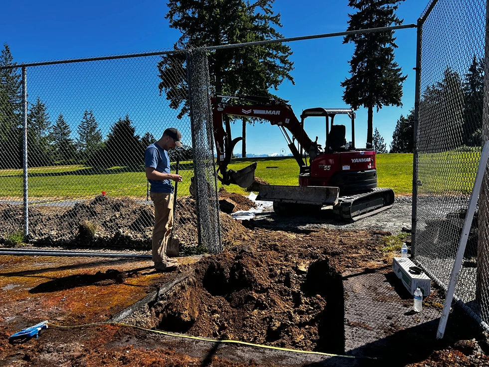 A hole dug for electrical conduit installation in Seattle