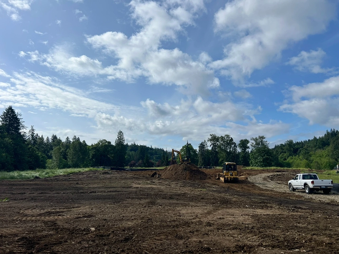 A grassland cleared of grass and shrubs for site preparation in Seattle