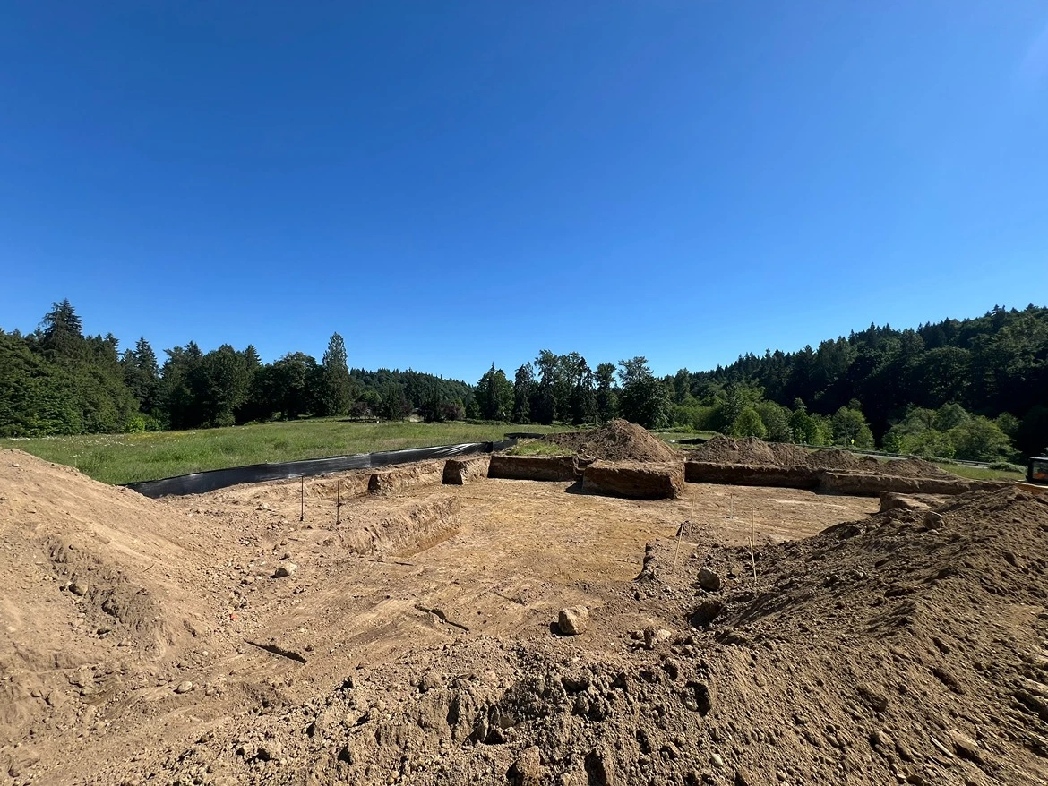 An excavation site being prepared for foundation in Seattle