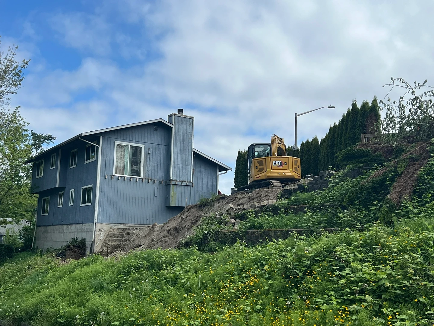 Preparing a Slope for New Construction in Des Moines, WA Before Image 3