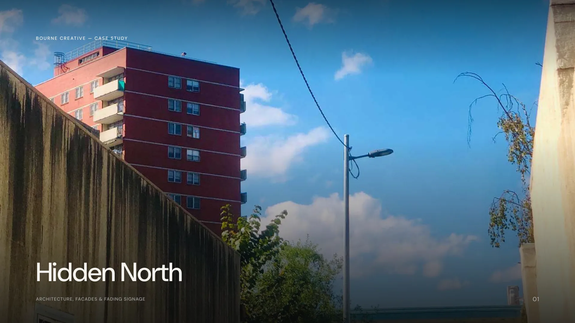 Hidden North case study cover: a Carlton laneway framing a red-brick tower, street lamp and open sky