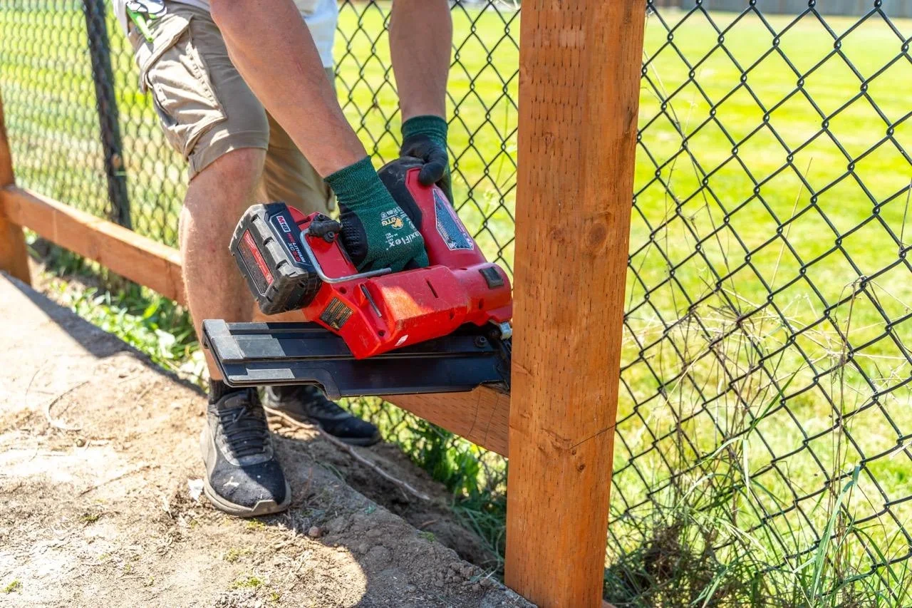 Fence installation crew working on a Salmon Creek property