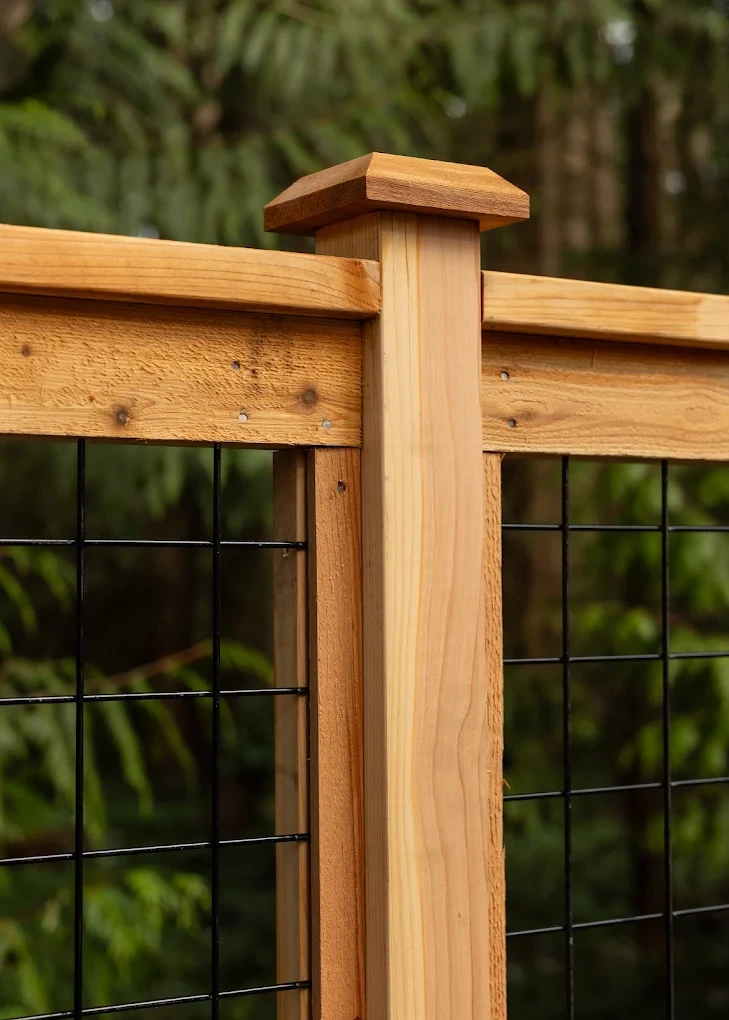 Aging fence with worn boards along a residential property
