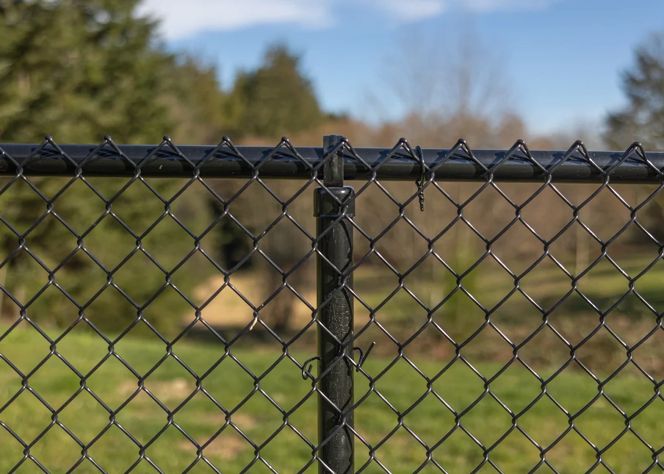 Chain link fence installed on a large Felida lot