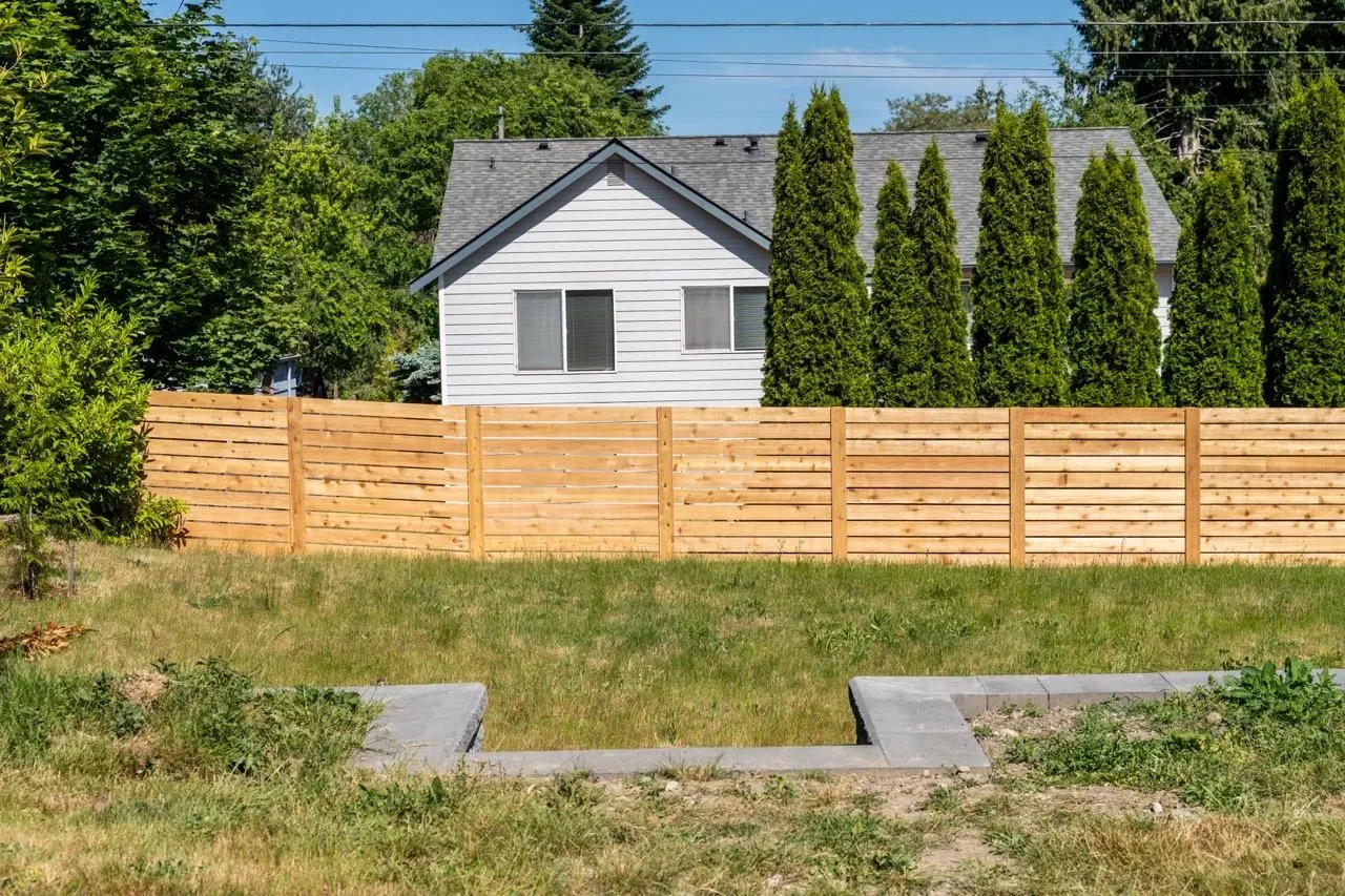Fence post installation underway on a Felida residential property