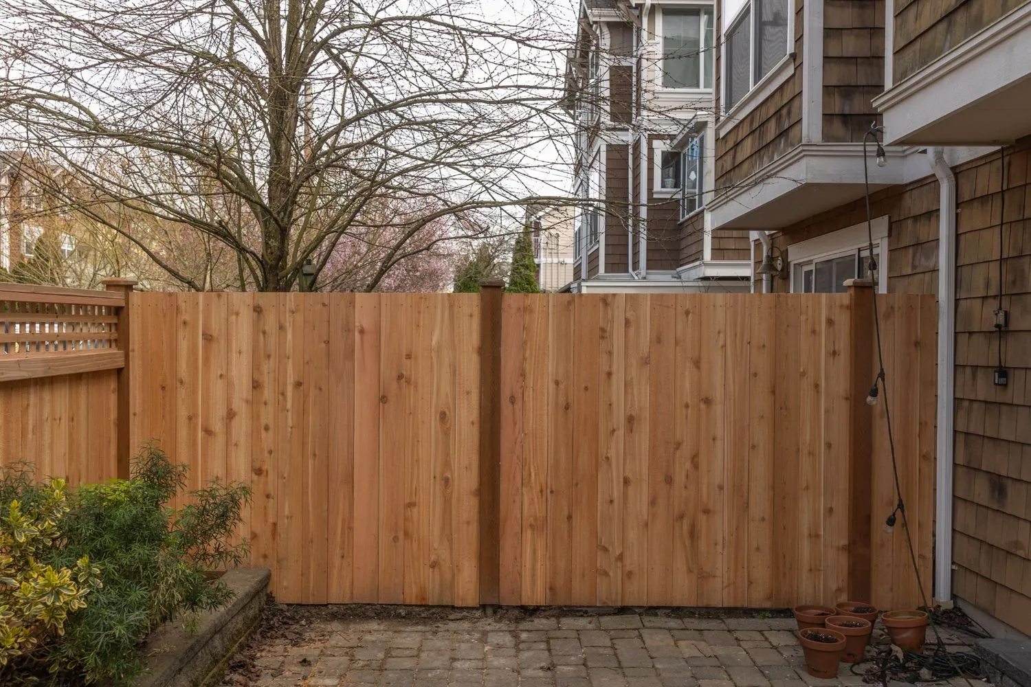 A cedar fence installed in a front yard of a Vancouver, WA home