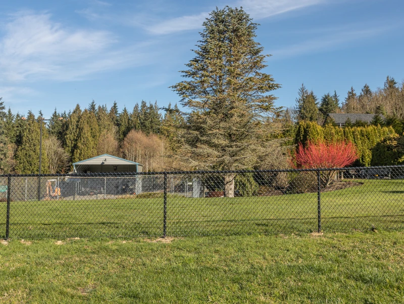Newly installed chain link fence securing a ranch in Vancouver