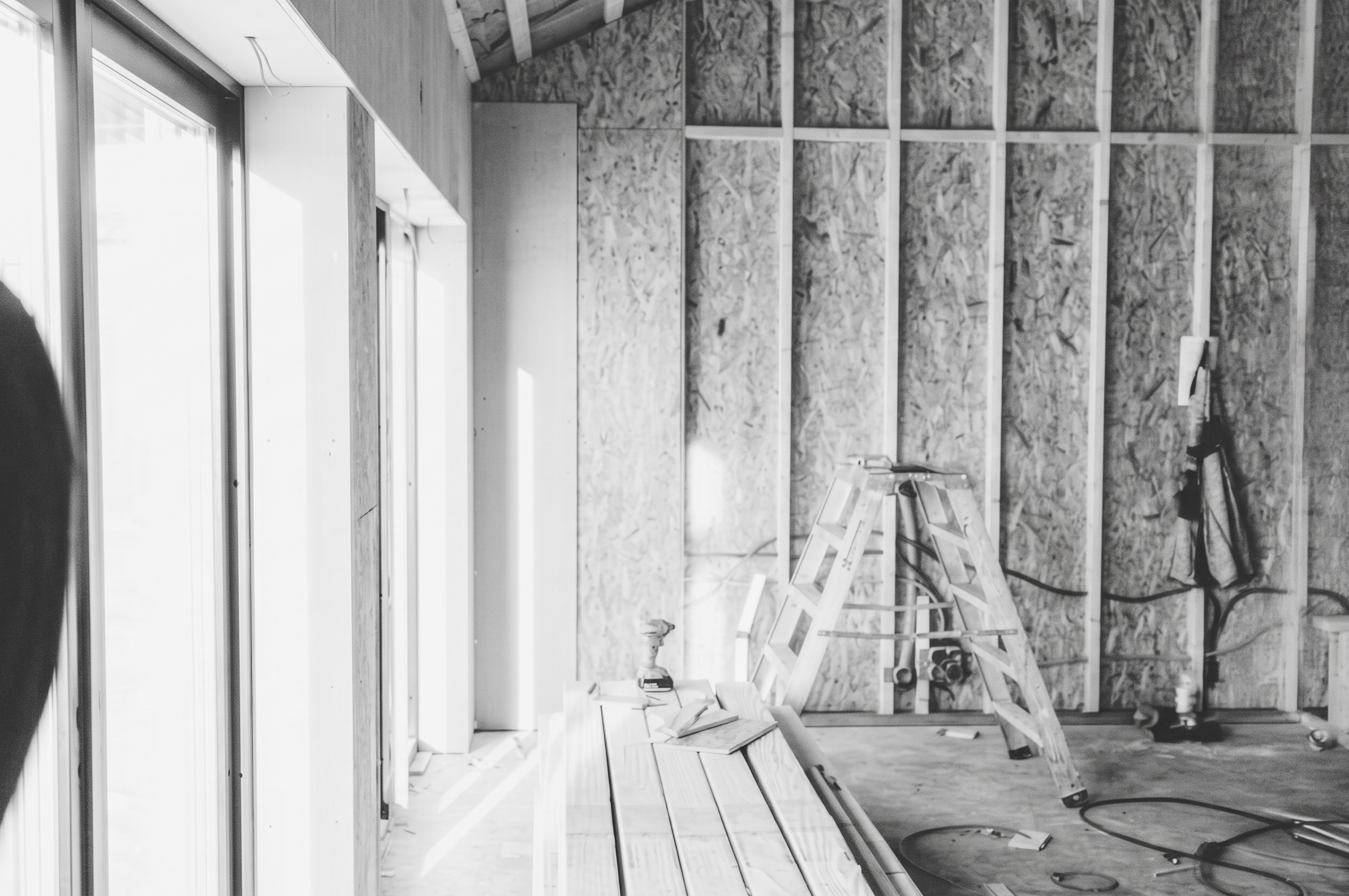 Interior of a home under construction with exposed framing