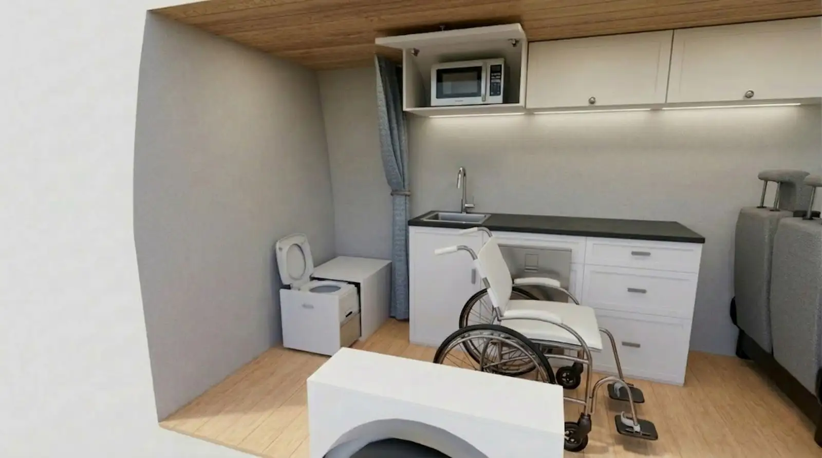 3D rendering of a van interior with wheelchair, portable toilet, sink, microwave and white cabinets