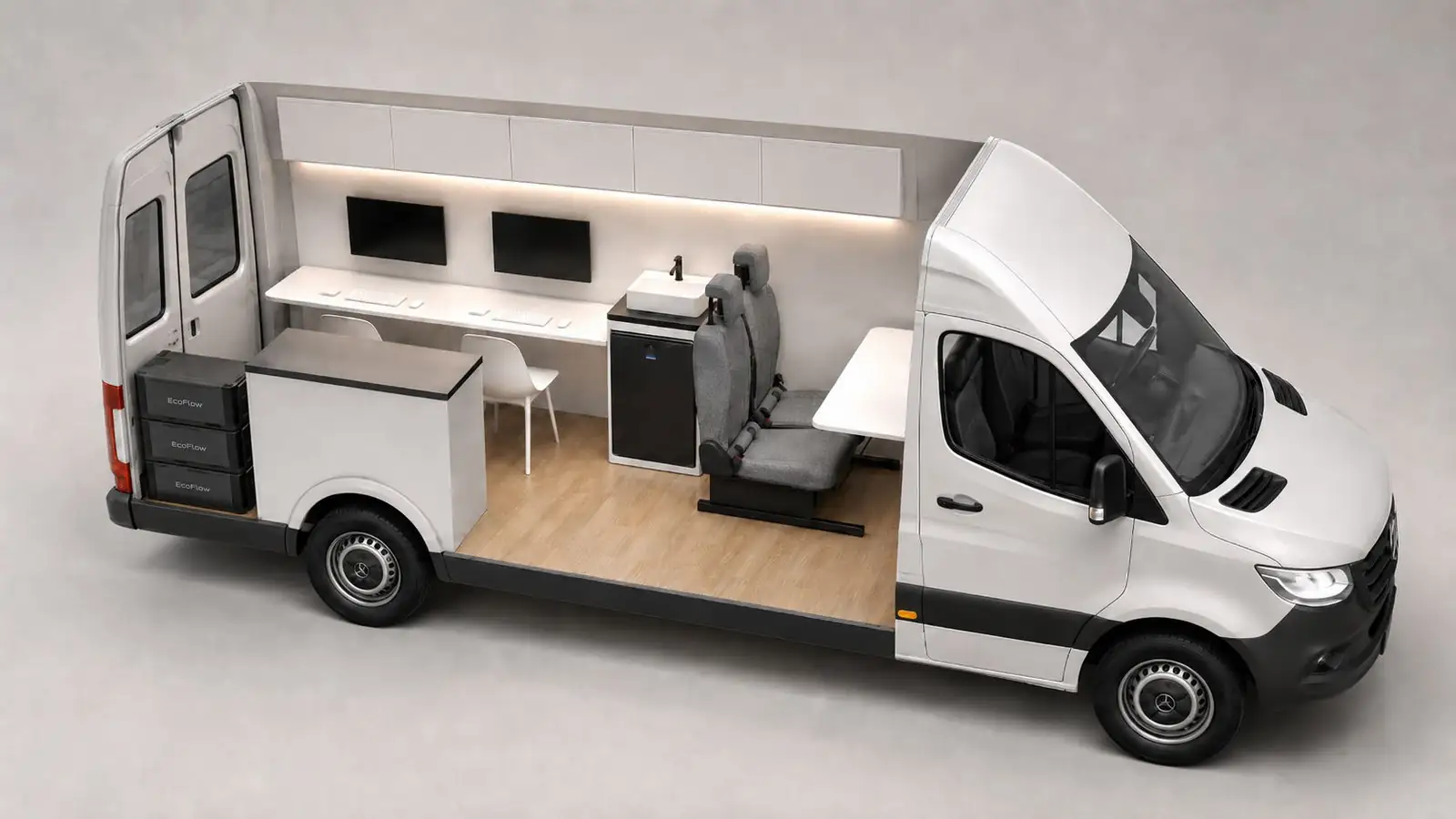 3D cutaway rendering of a white Mercedes Sprinter mobile office with long desk, two wall monitors, sink and fridge