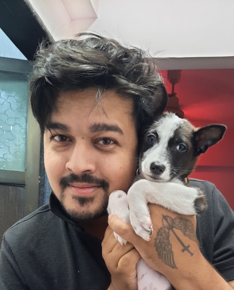 Shashank holding a small dog