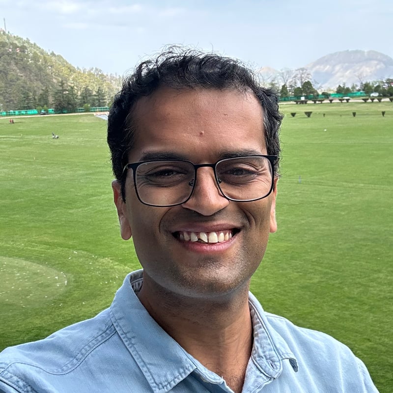 Harshil smiling outdoors