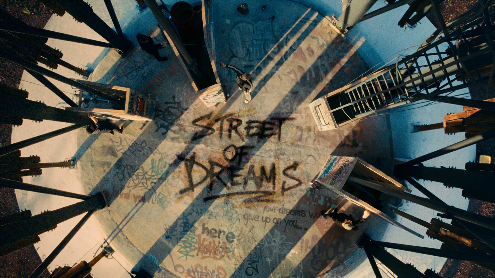 Looking down onto courtyard with Street of Dreams graffiti on the floor