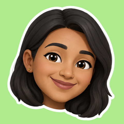 Smiling woman with short blonde hair wearing a bright green sweater and green beaded earrings against a yellow background.