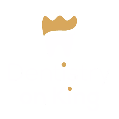 Dentistry on King logo with a stylized golden crown above the text.