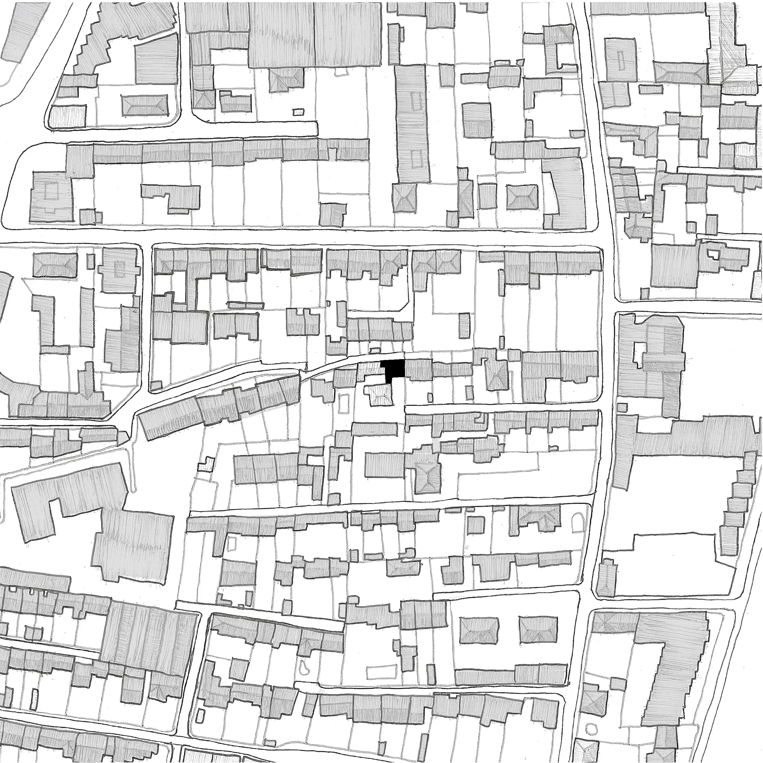 Detailed hand-drawn city map with streets and shaded buildings, highlighting one small black building.