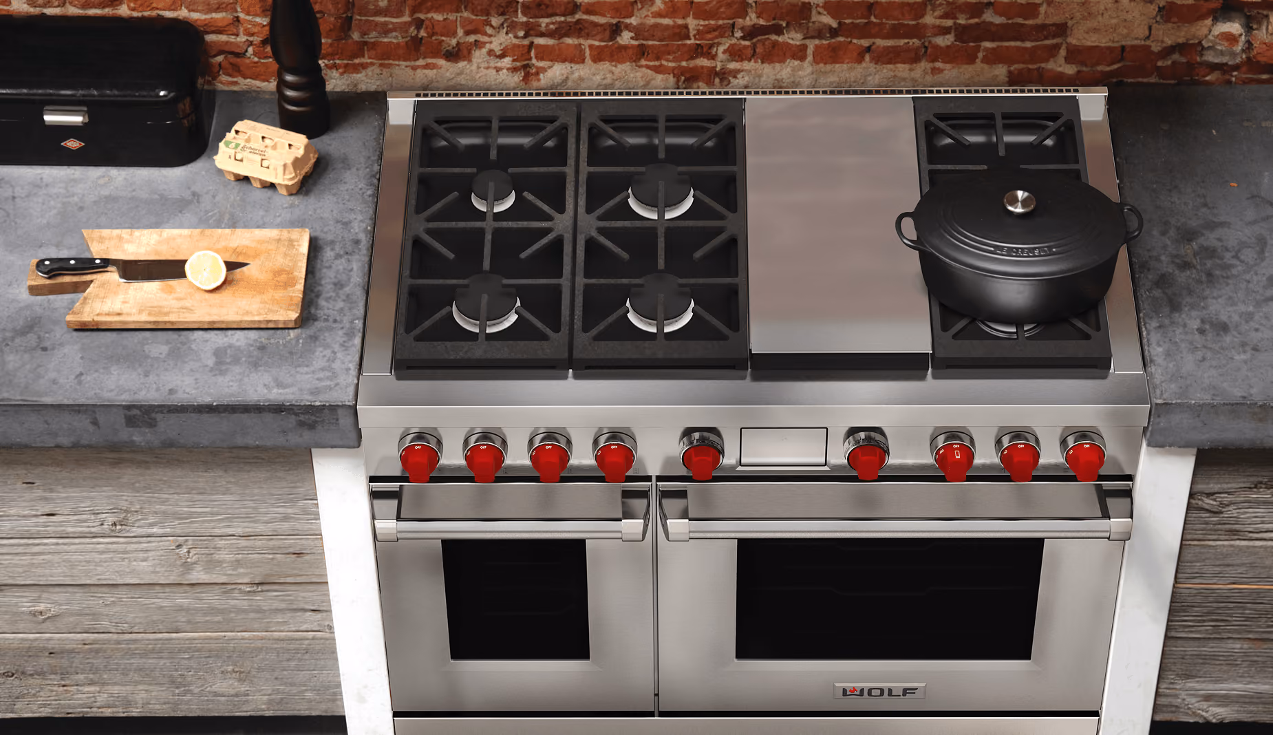 Wolf range with dual-stacked sealed burners and signature red control knobs