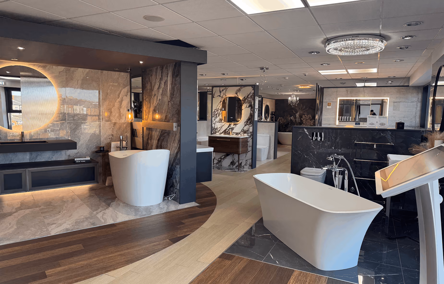 Curated bathroom and kitchen displays across three floors at LPM showroom, Leigh