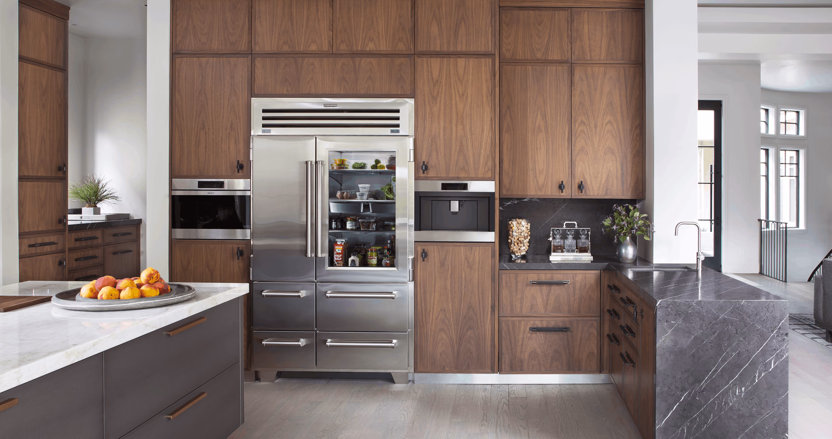Contemporary luxury kitchen with integrated appliances and refined cabinetry at LPM