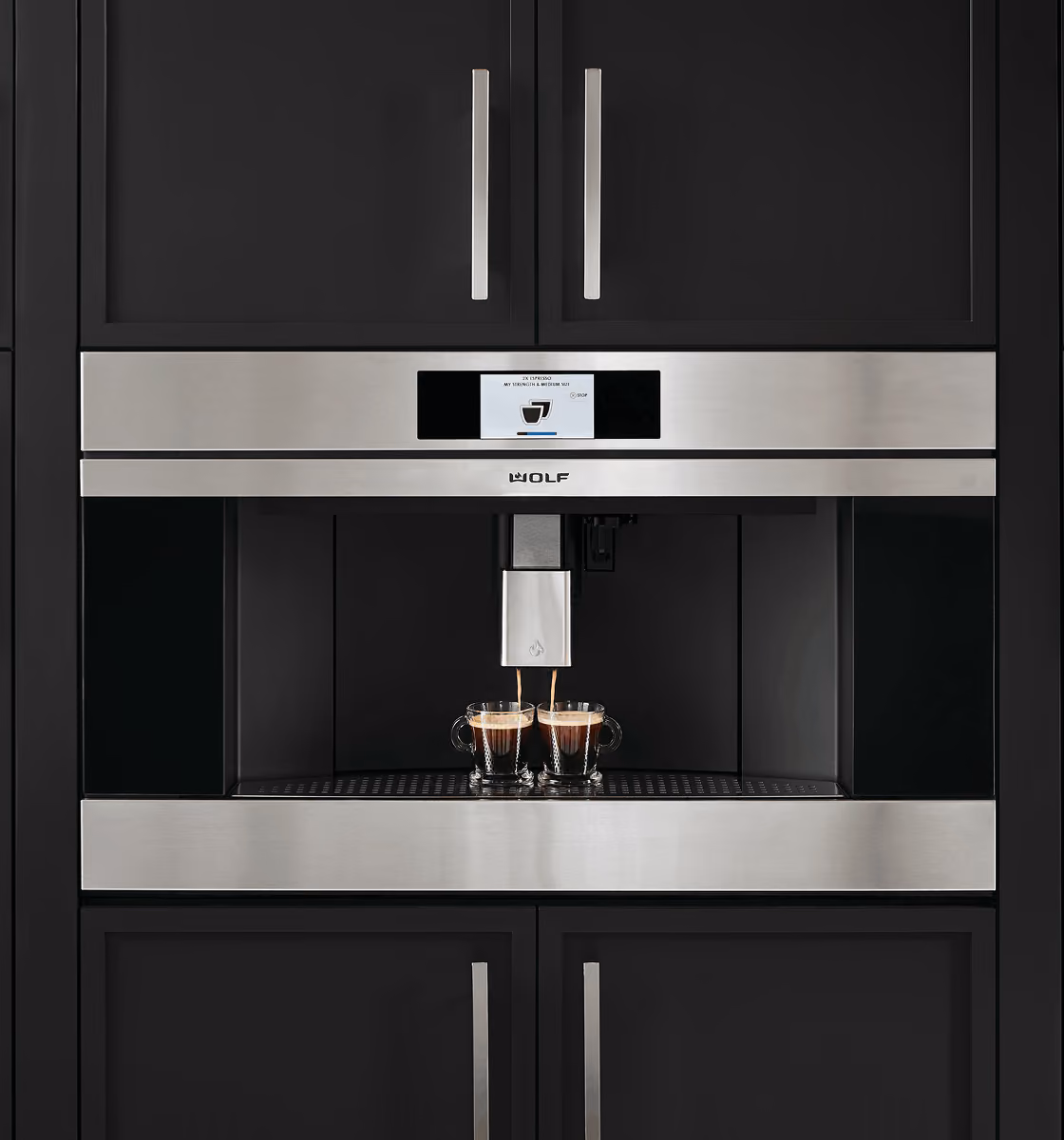 Wolf built-in coffee machine integrated into kitchen cabinetry