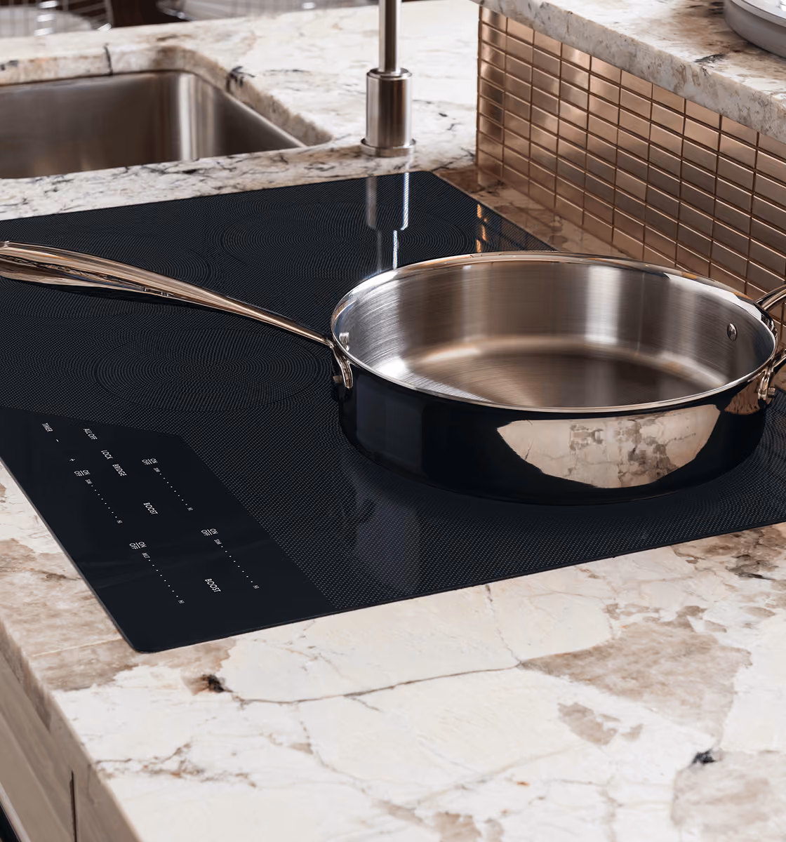 Wolf induction cooktop with flush glass surface and touch controls