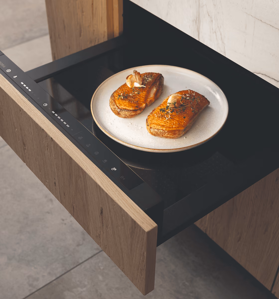 BORA warming drawer for keeping plates and dishes at temperature