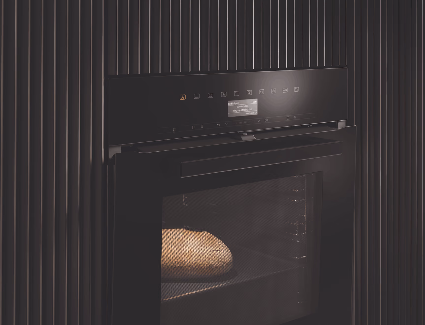 Miele VitroLine appliances with slim colour-coordinated glass and metal handles