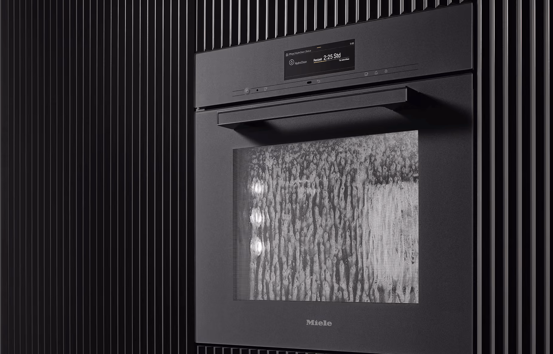Miele integrated kitchen appliances showing German engineering and timeless design