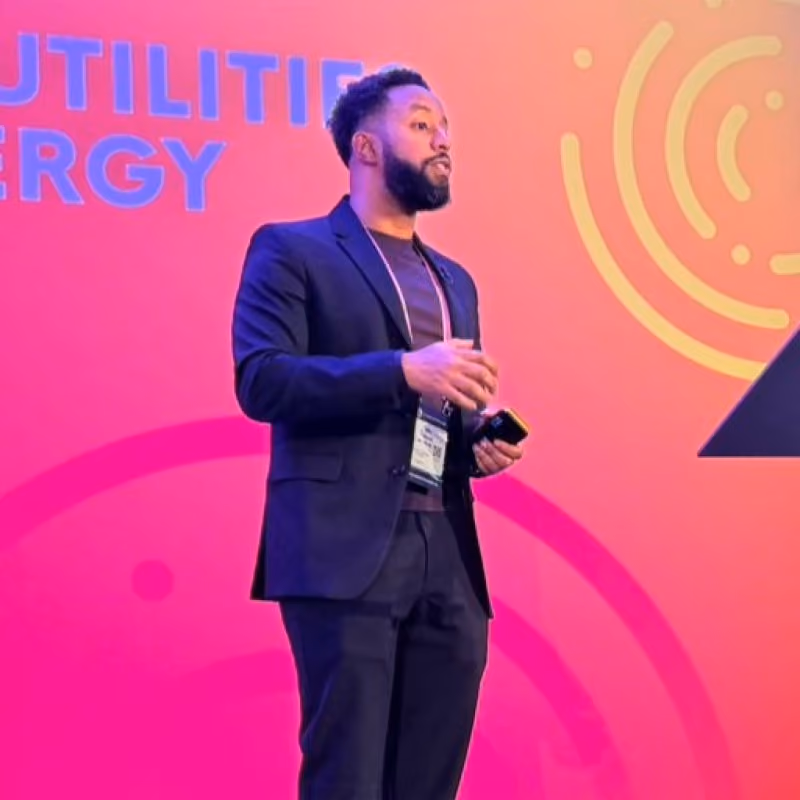 Mo Nuur, Product Lead for CX & Digital at E.ON Next, speaking on stage
