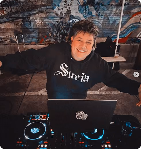 DJ Sucia behind the decks