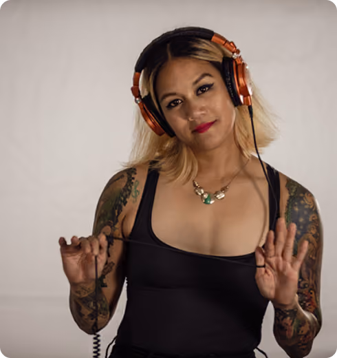DJ Vieux Carre wearing headphones