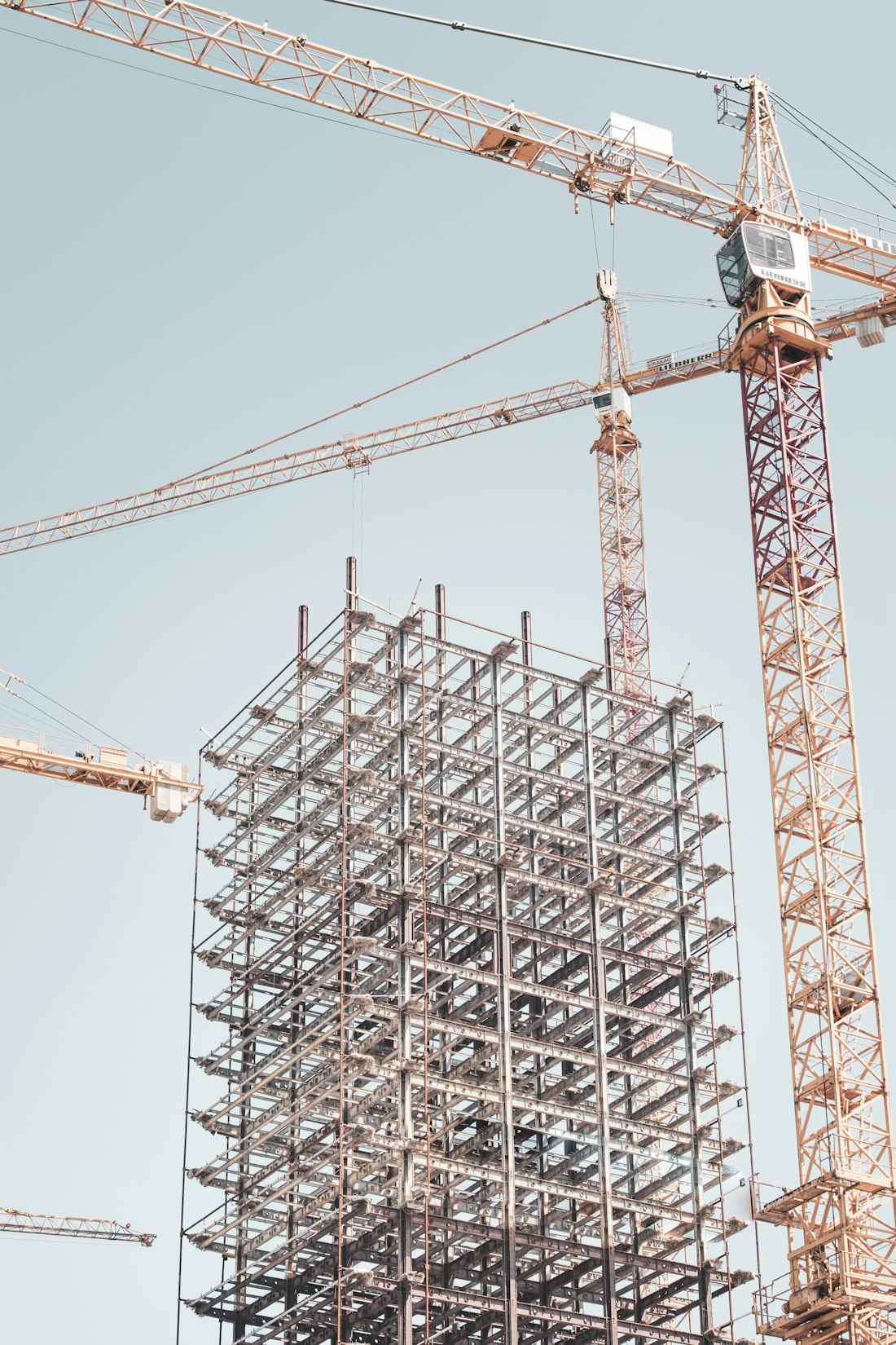 Steel building frame being erected on site