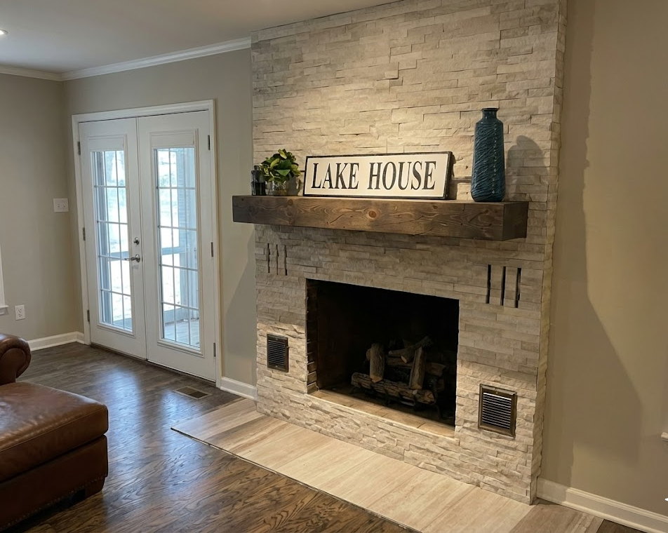 Finished fireplace tile feature wall creating a polished focal point in a living room.