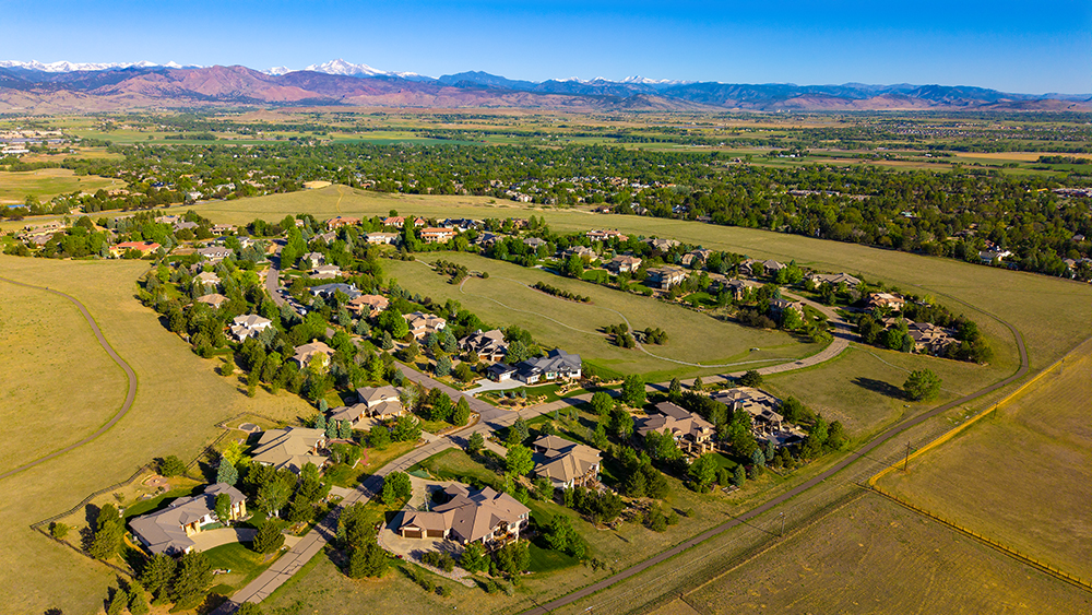 Aerial drone photo of the Legend Ridge neighborhood near Niwot, Colorado, with large lots and expansive Front Range views.