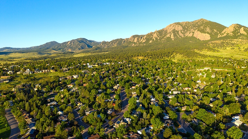 Aerial drone photo of the Table Mesa neighborhood in Boulder, Colorado, with views of the Flatirons and Bear Peak.