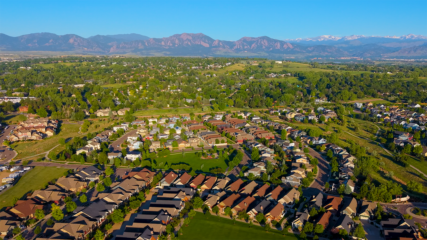 Aerial drone photo of Louisville, Colorado, a small city between Boulder and Denver with a walkable downtown Main Street.