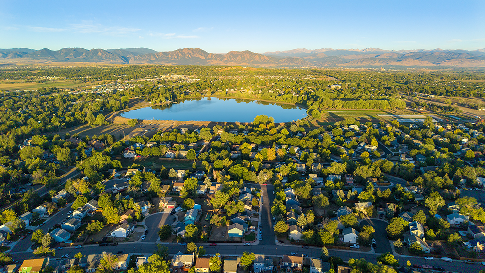 Aerial view of Centaur Village North in Lafayette, with Waneka Lake and the Flatirons beyond